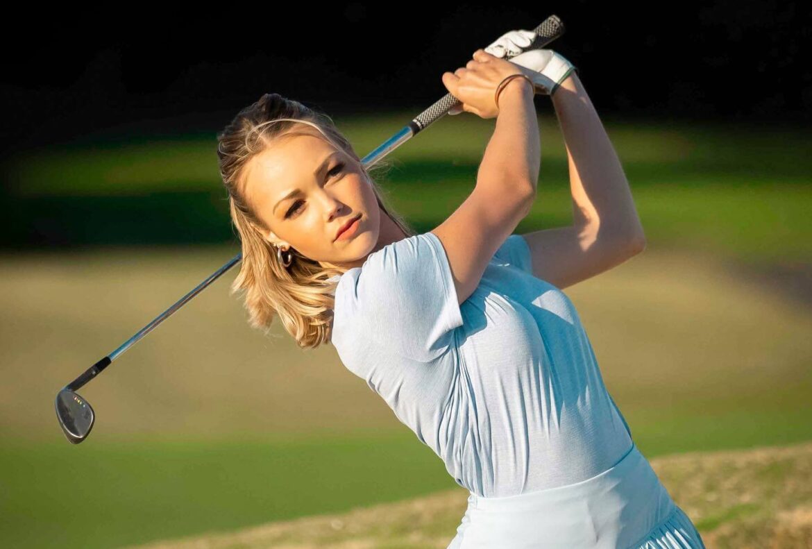 Claire Hogle plays golf