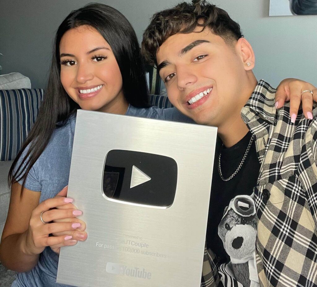 Janexy Sanchez with her boyfriend holding Youtube Silver Award