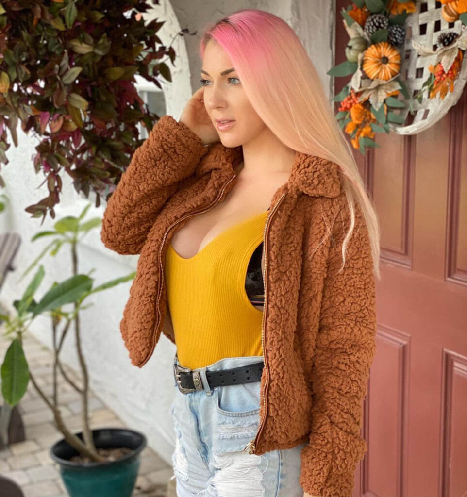 Kristen Hughey wearing Threadbare teddy zip through jacket in tan with Casual High Waist Torns Solid Color Jeans Shorts and STRAPPY KNIT TOP