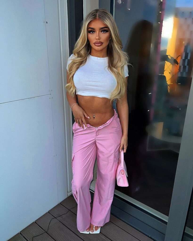 Mia McNiff wearing crop top embroidered and High Waisted Flap Pocket Cargo Jeans