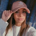 Stefania Decorato  wearing adidas cap during a selfie