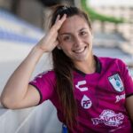 Marta Alemany in her football costume while smiling towards camera