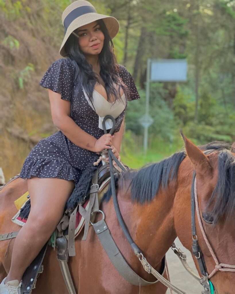 Maria José is riding on a horse as she adores and loves horse riding.