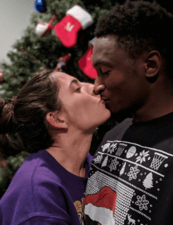 Marques Brownlee is with his girlfriend and kissing each other and celebrating Christmas.