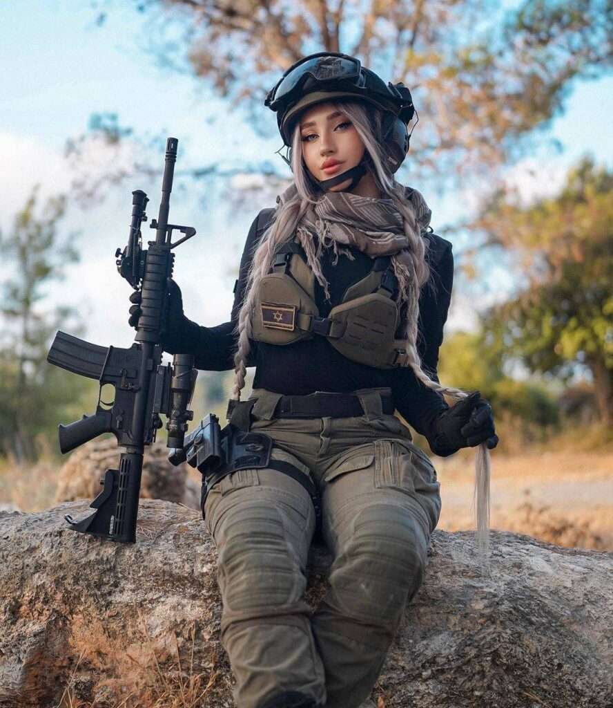 Natalia Fadeev is looking cute while holding a gun in her hands and ready to shoot