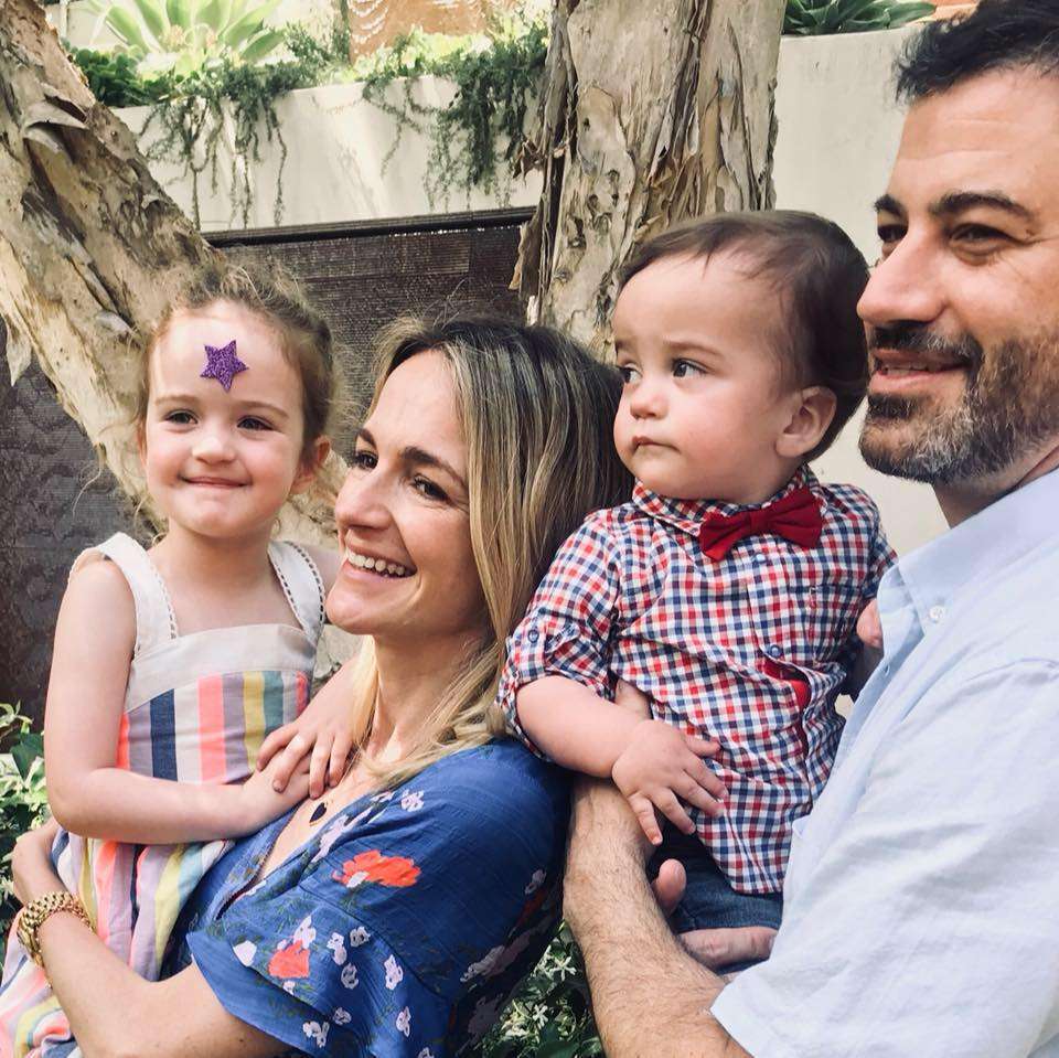 Jimmy Kimmel is on vacations and is posing for a picture with his family including wife and children.