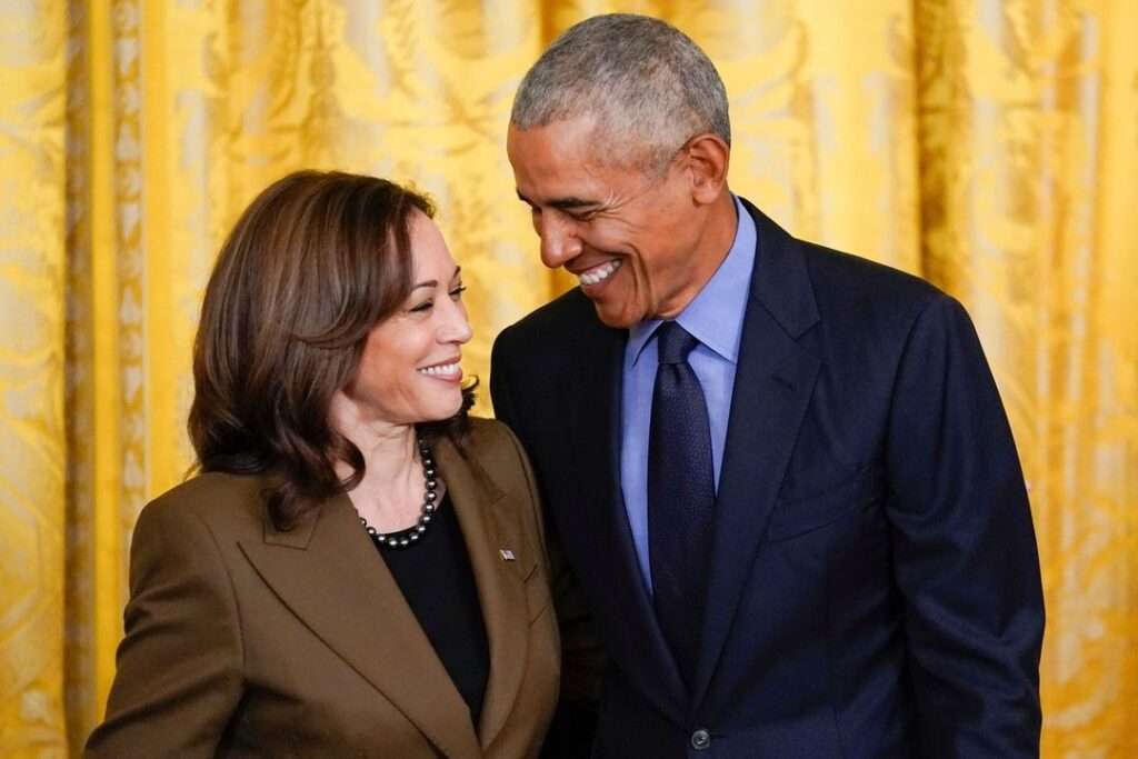 Kamala Harris is with Barak Obama and they are just posing for a picture while laughing.