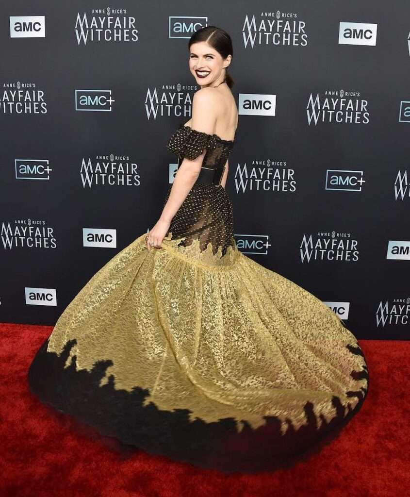 alexandra daddario sexy is wearing stlish lehnga and smiling while posing for the picture