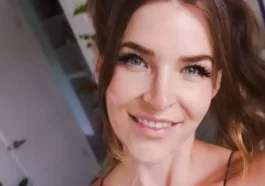 Kitty Plays in the red sexy top while taking selfie from her room and smiling towards camera
