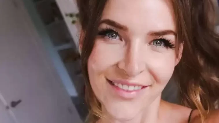 Kitty Plays in the red sexy top while taking selfie from her room and smiling towards camera