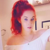 Love Randalin is wearing white shirt and chain or looking impressive and posing for the picture