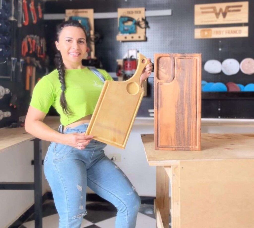 Sofia Ansari in the green t-shirt pair with blue jeans while smiling towards camera